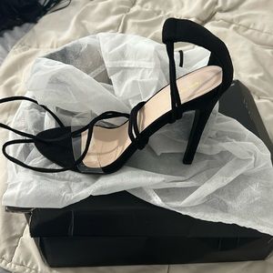 New clean and black high heels